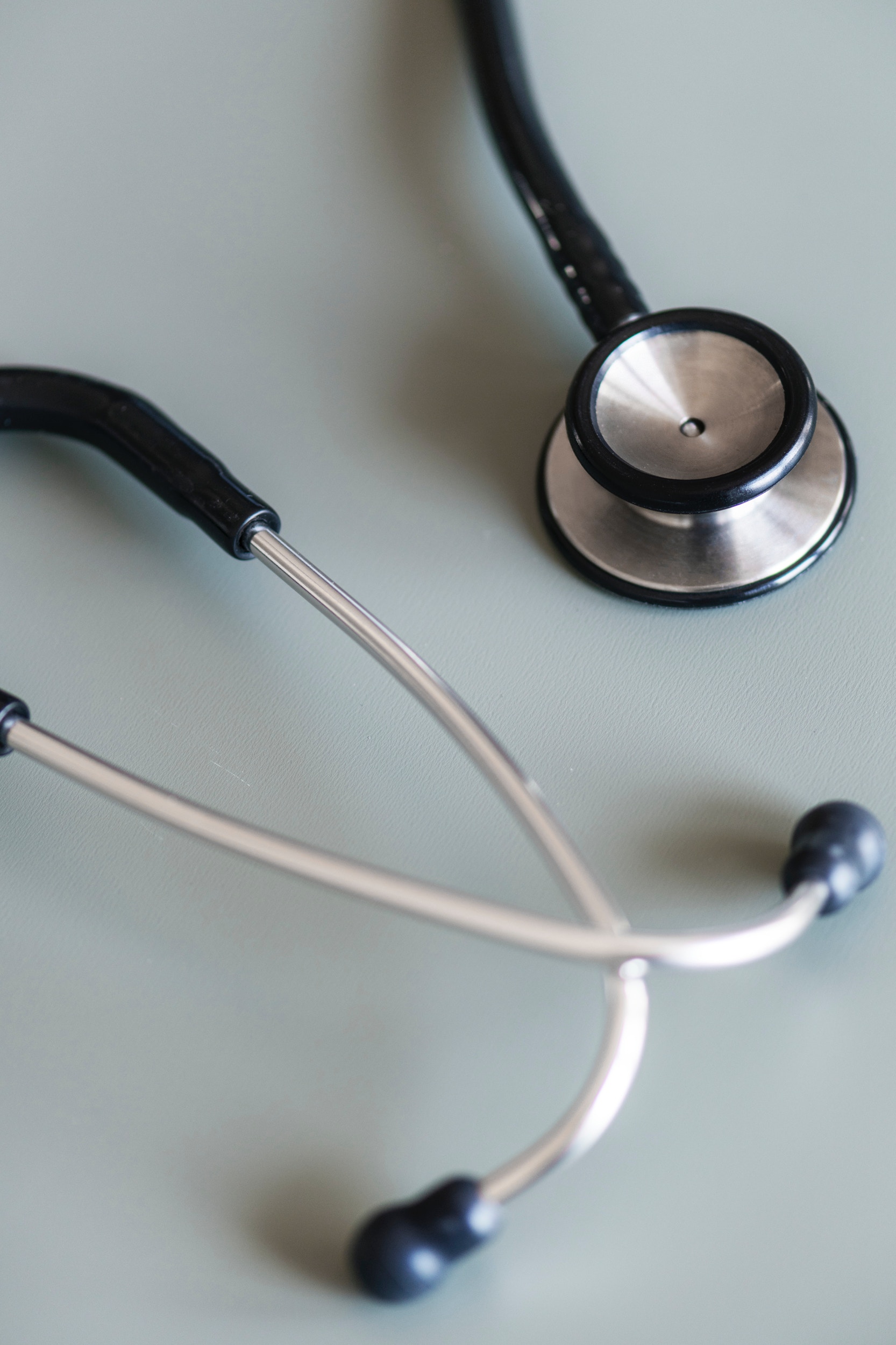 Picture of a doctors stethoscope lying on a desk