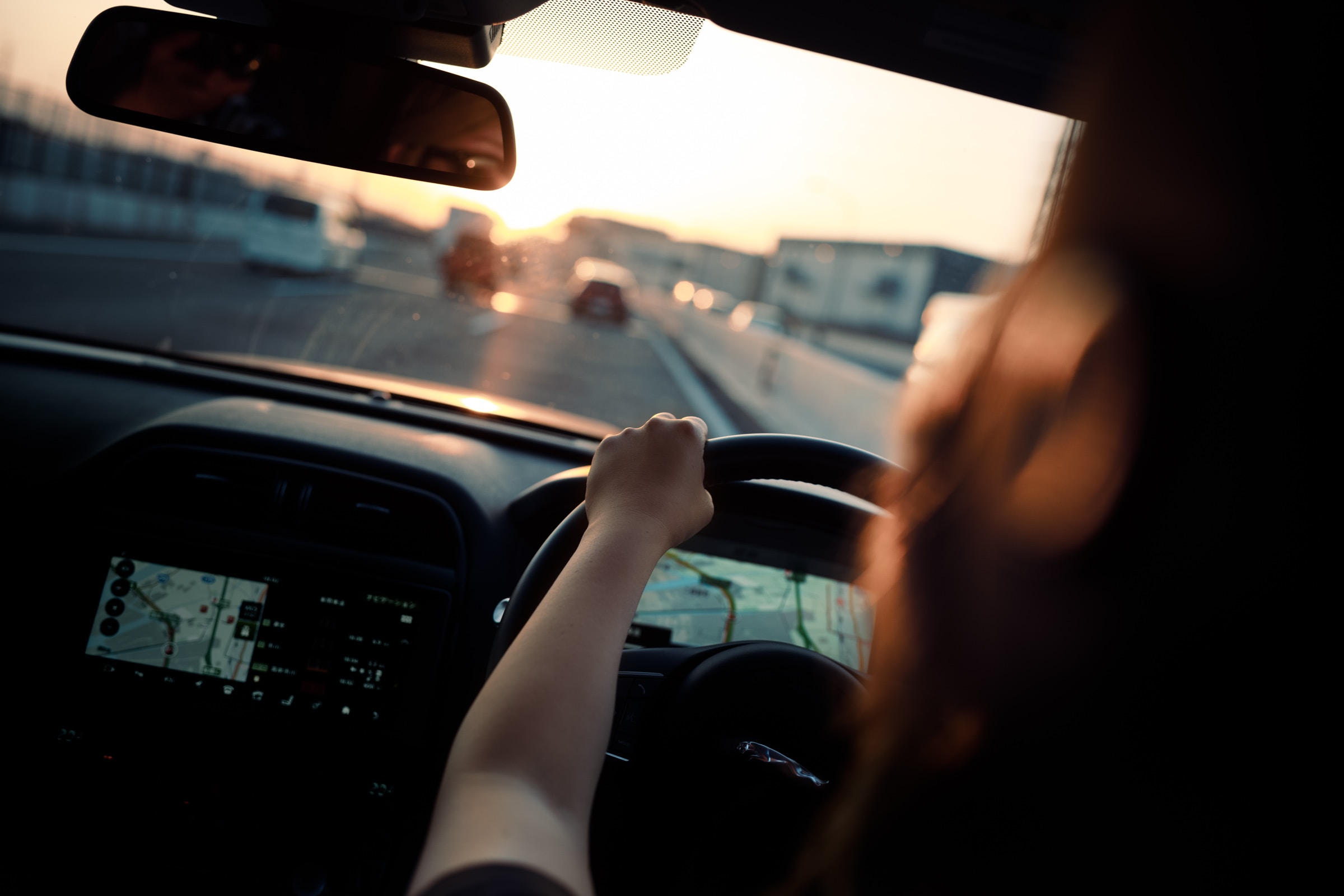 Woman in a car as she is about to learn to drive