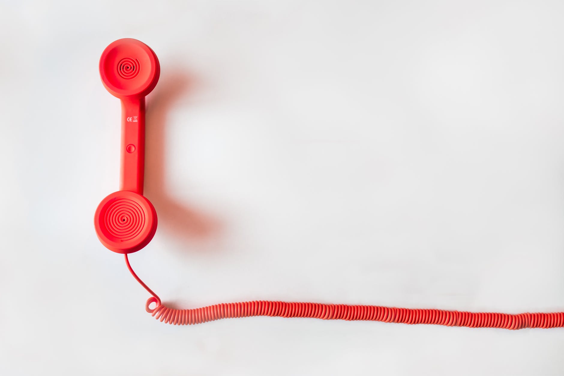Photo of a red 80's style phone