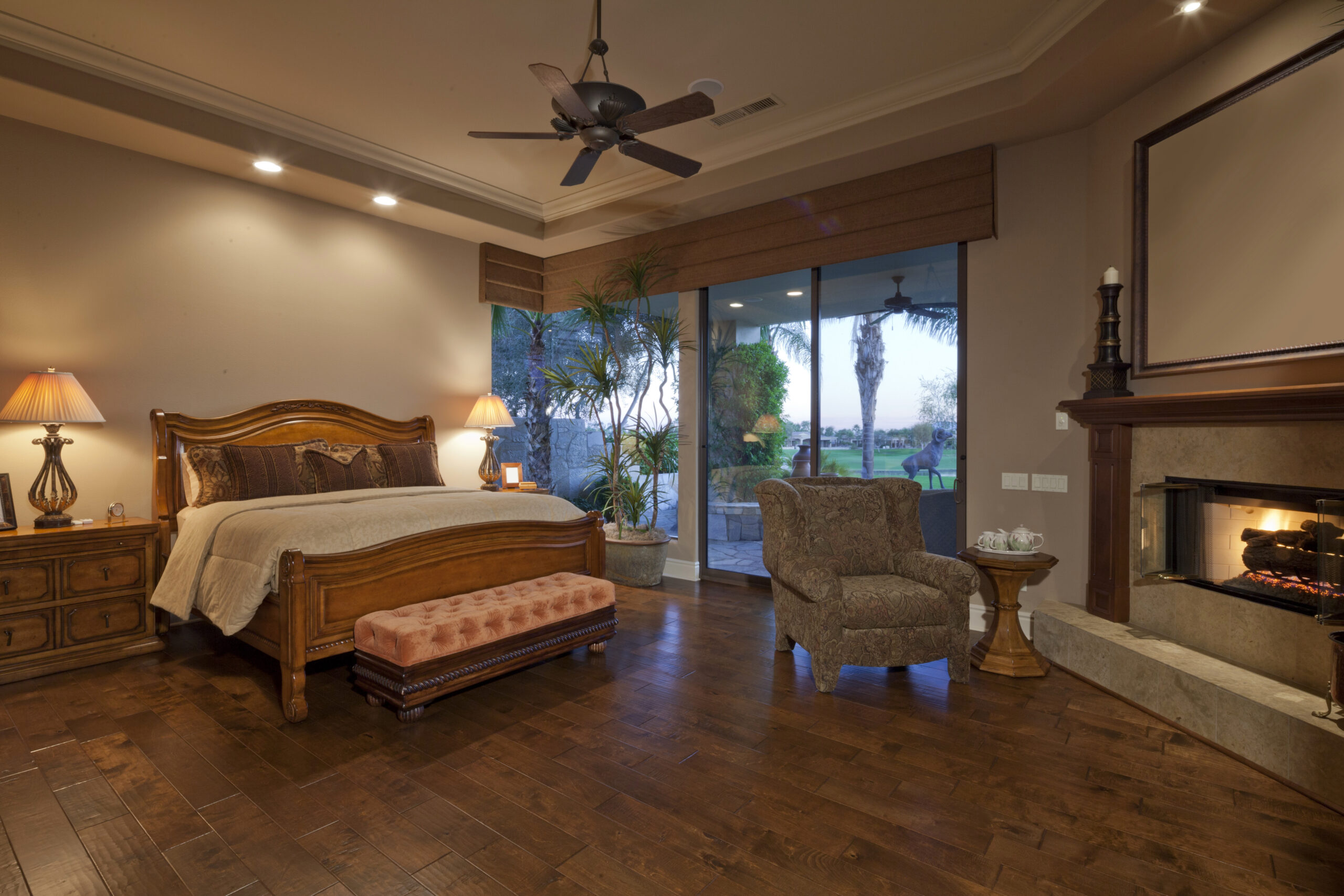 Bedroom showing Bed Frame and beautiful bedspread and an armchair