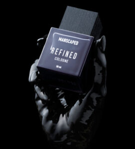 Refined Cologne by MANSCAPED™ Manscaped refined cologne being held